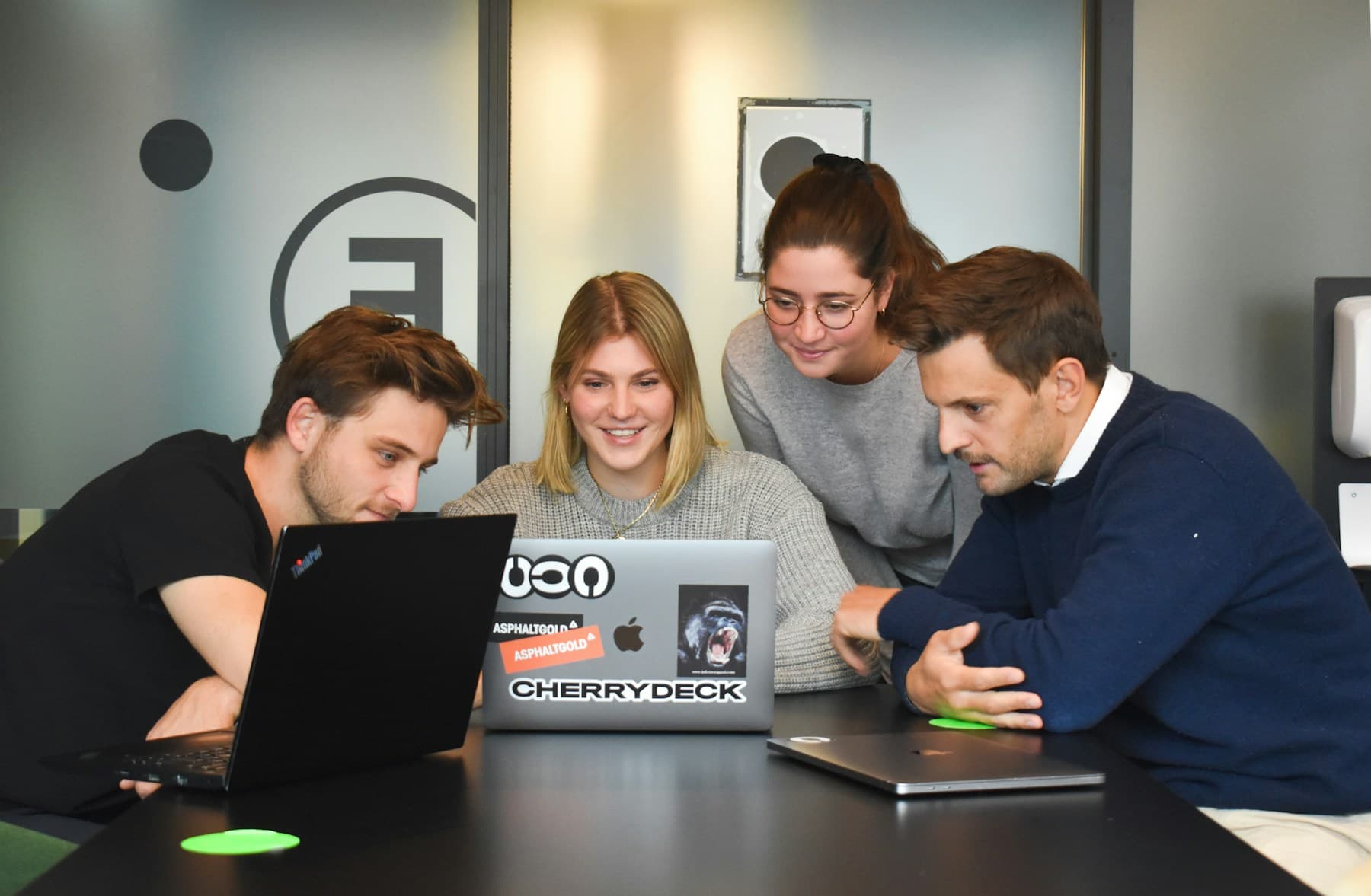 Colleagues reviewing work together